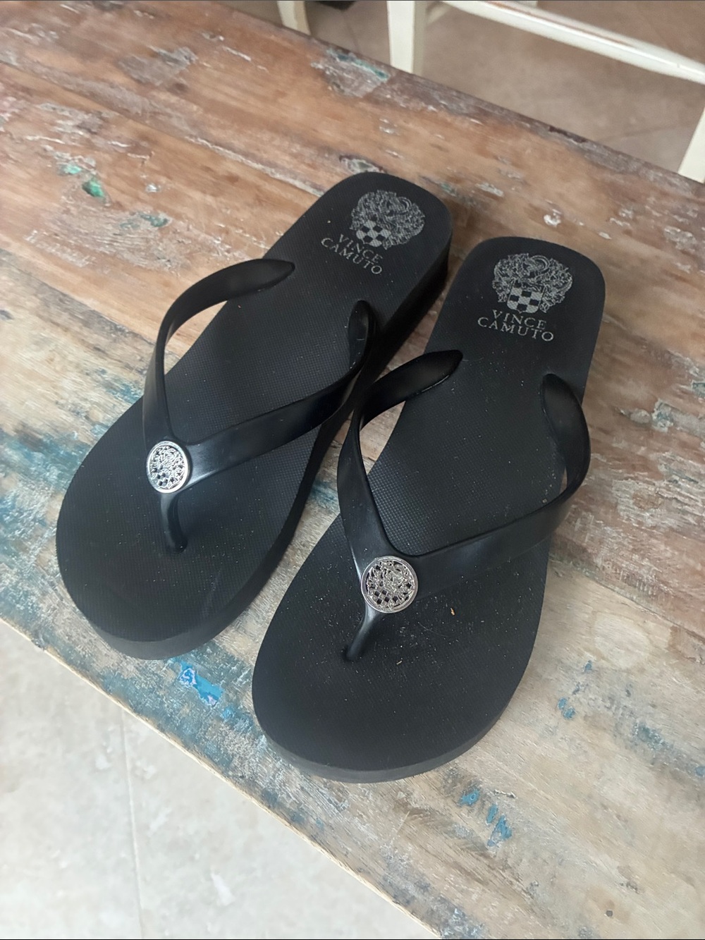 Vince Camuto Black Thong Sandals with Silver Medallion Accent